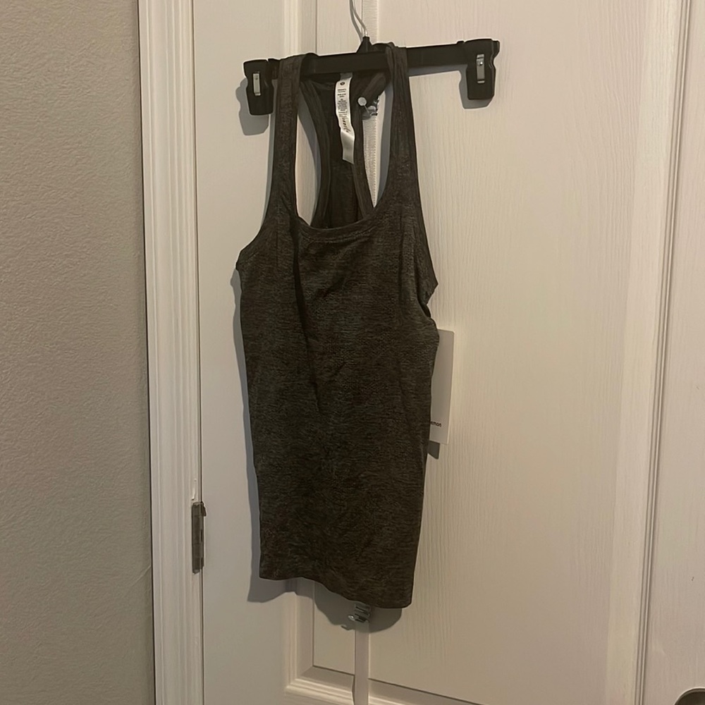 NWT swiftly tech racer back sz 4